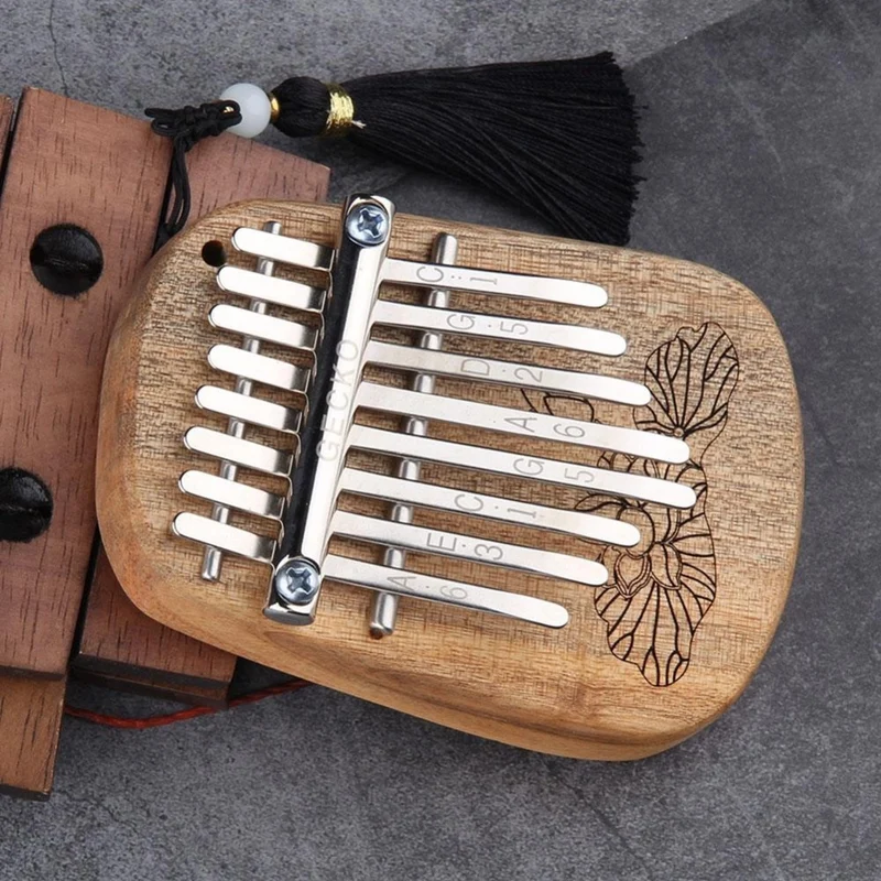 GECKO 8 Key Mini Kalimba Finger Thumb Piano Music Gift for Beginner