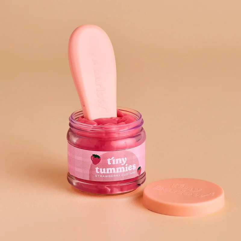 Tiny Harlow Tiny Tummies – Petit pot magique pour poupée fraise