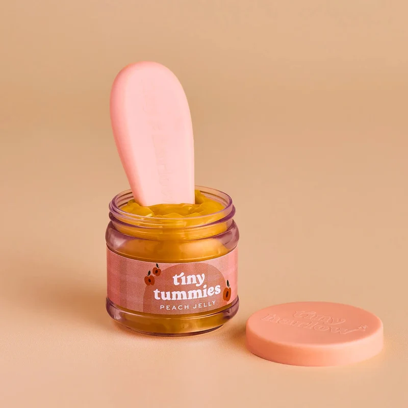Tiny Harlow Tiny Tummies – Petit pot magique pour poupée pêche