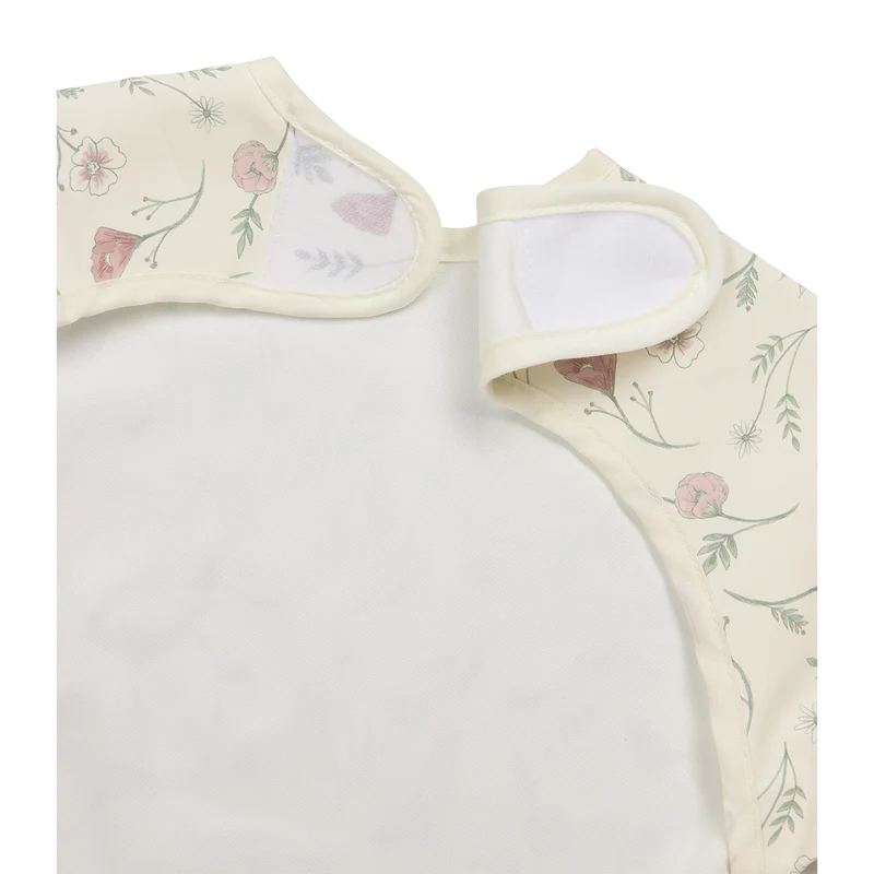 Bavoir à manches courtes fleuri imperméable 9 à 18 mois - Meyco Baby