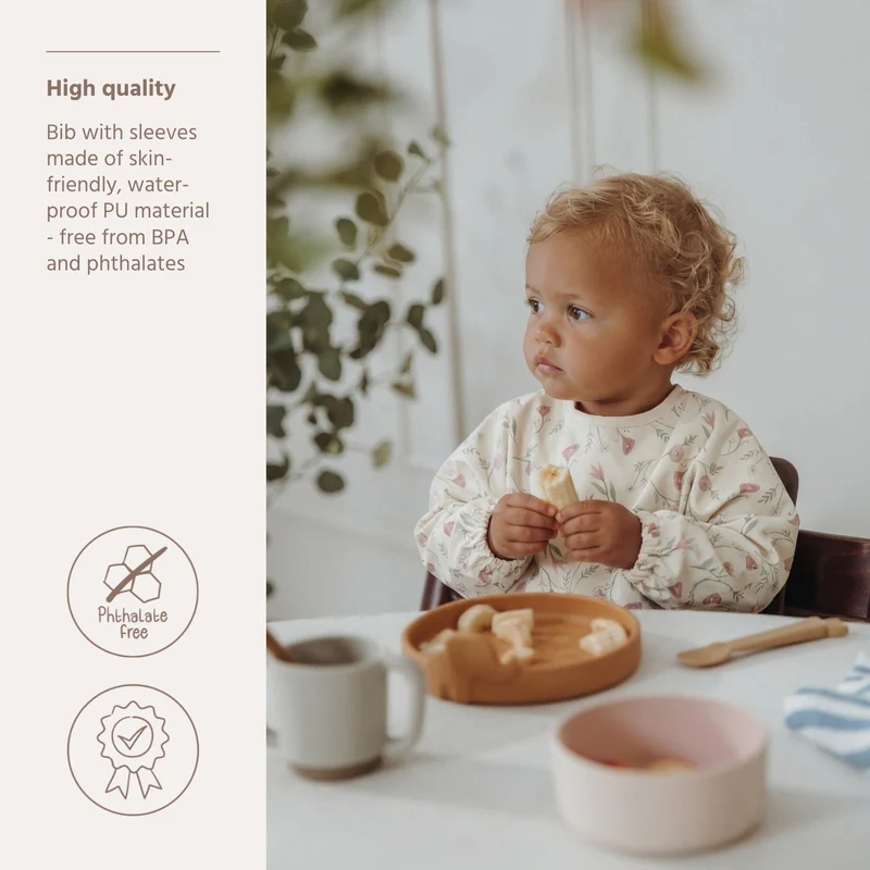 Bavoir à manches courtes fleuri imperméable 9 à 18 mois - Meyco Baby