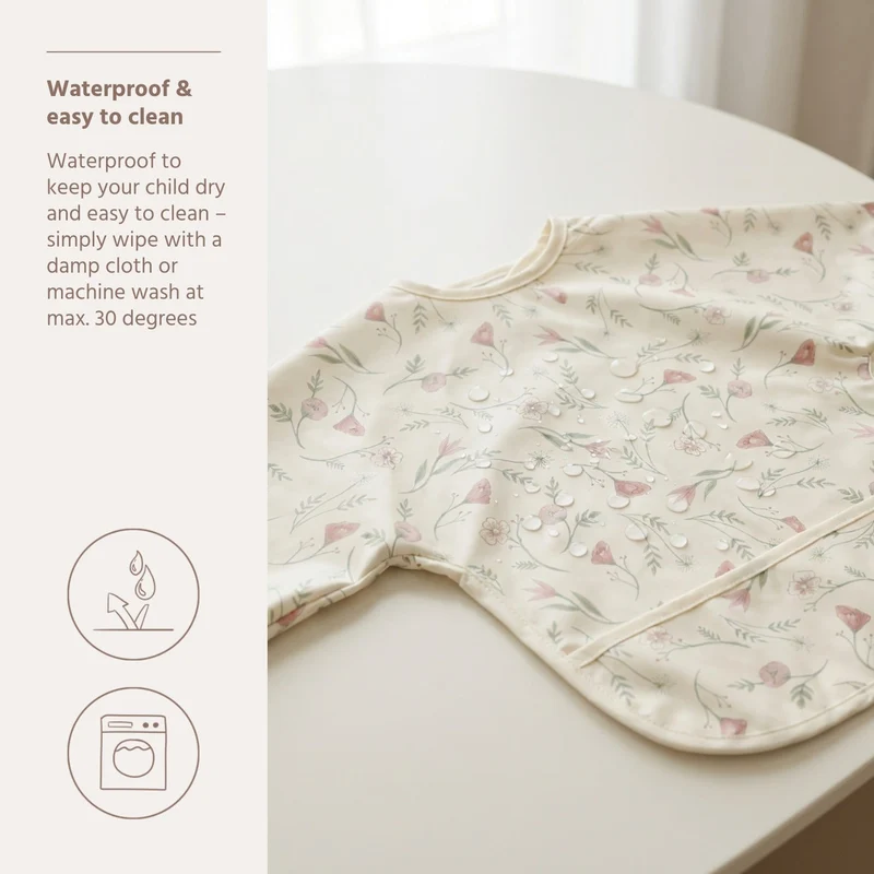 Bavoir à manches courtes fleuri imperméable 9 à 18 mois - Meyco Baby