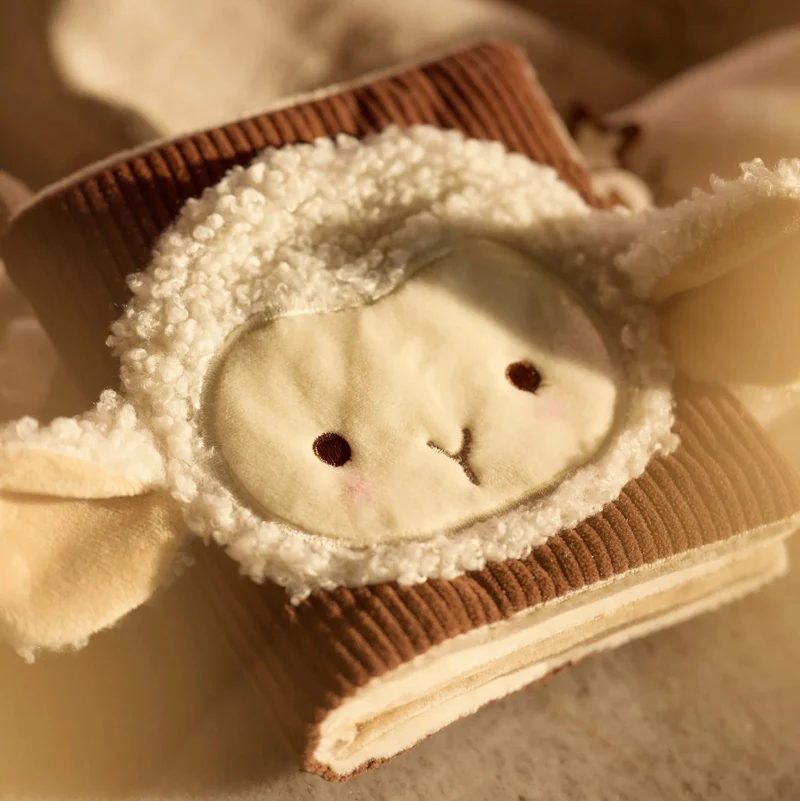 Livre d’activités bébé Woolly – Jollein