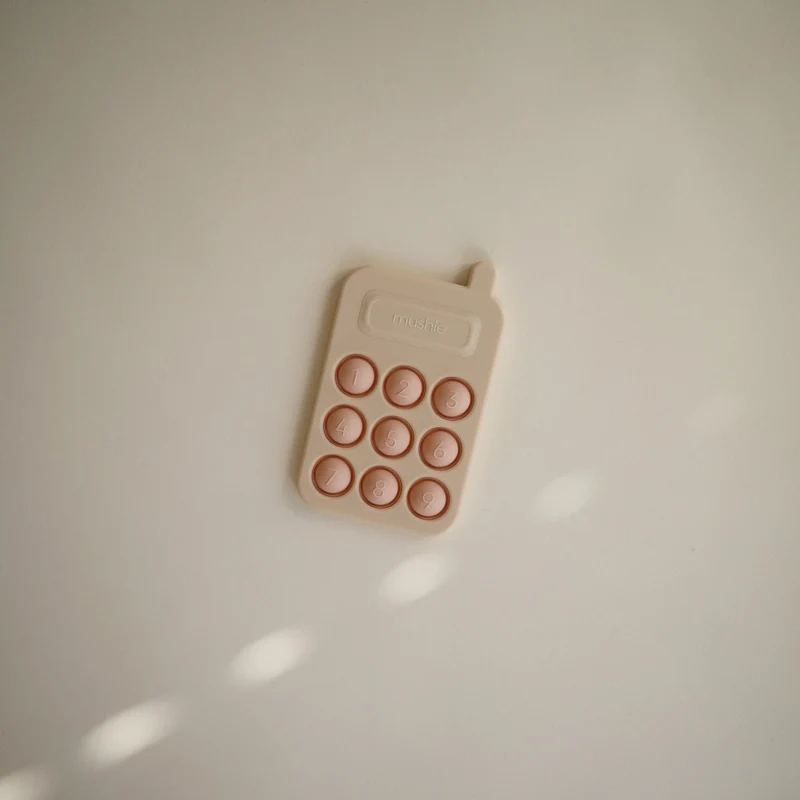 Jouet à presser Téléphone Rose