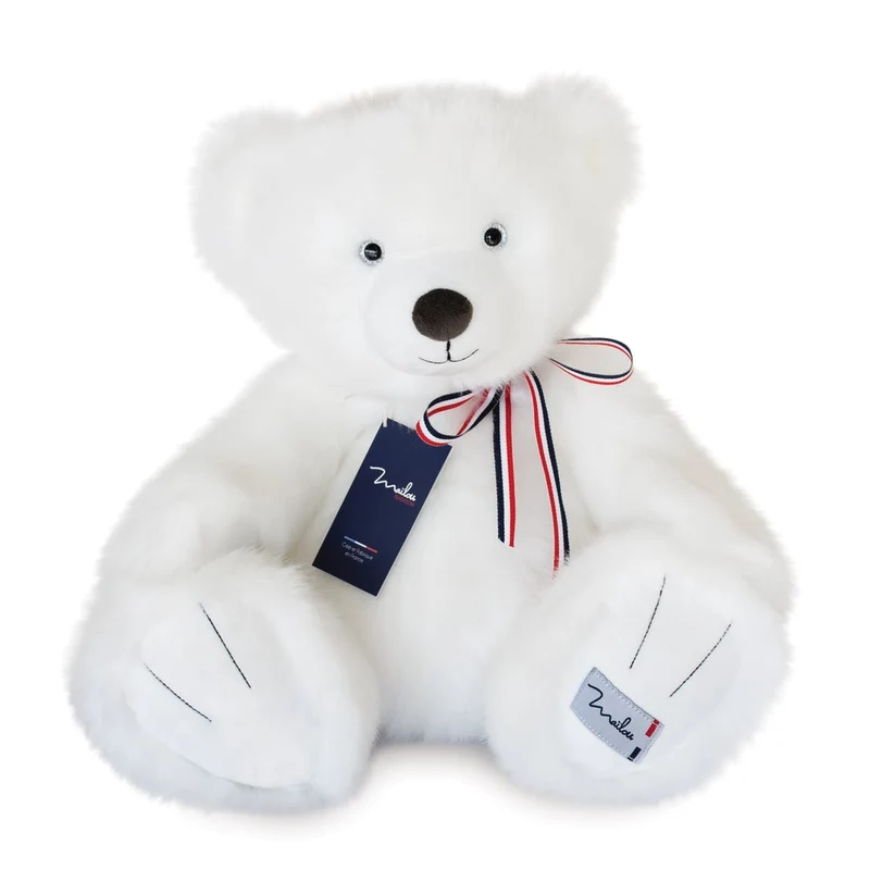 L'ours en peluche blanc neige